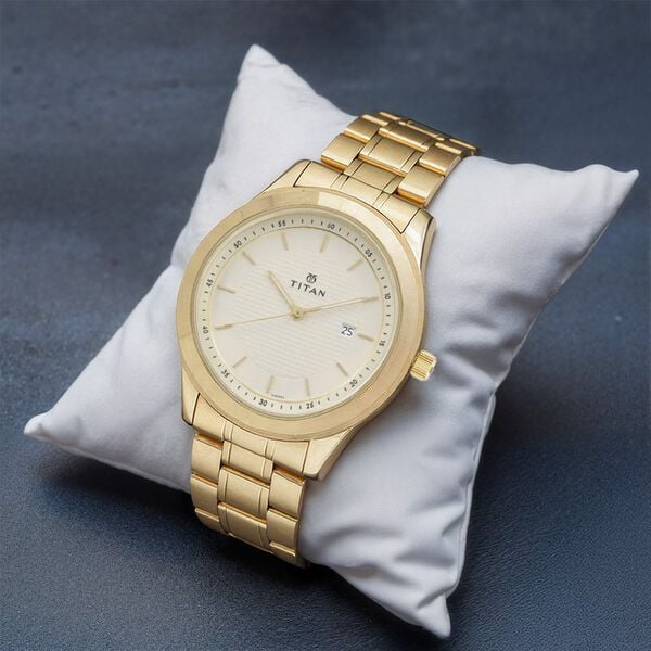 Titan 1627YM04 Champagne Dial Gold Stainless Steel Men’s Analog Watch