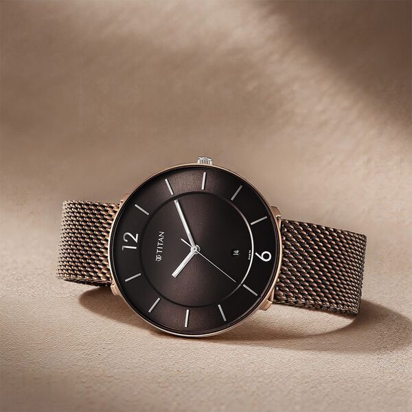 Titan 1849KM04 Analog Quartz Men’s Watch with Brown Dial and Brown Stainless Steel Strap