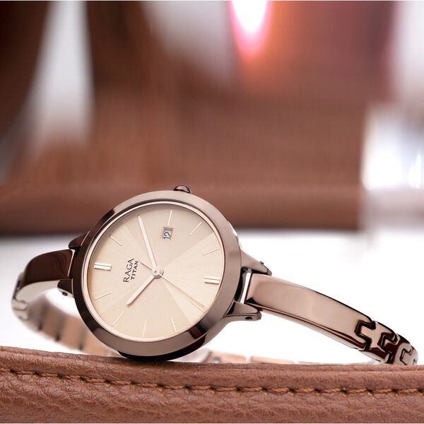 Titan 2578QM01 Women’s Rose-Gold Dial Analog Watch with Brown Metal Strap