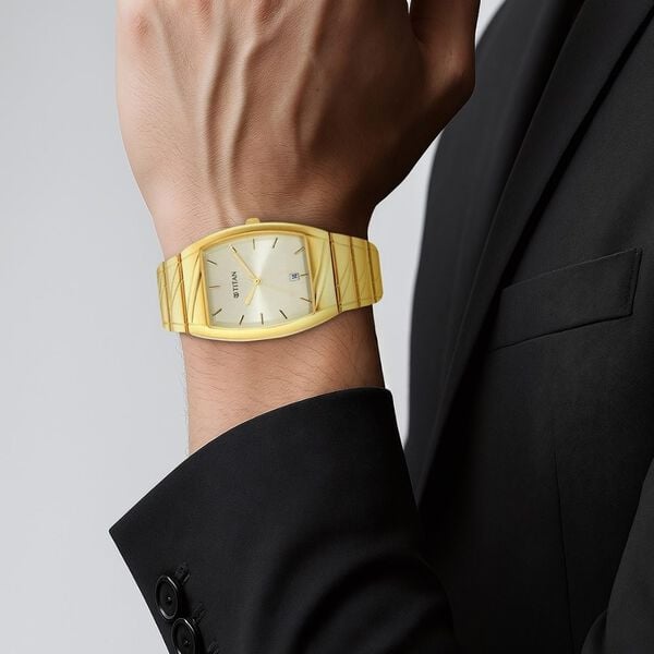 Titan 9315YM05 Quartz Champagne Dial Gold Stainless Steel Strap Men’s Watch