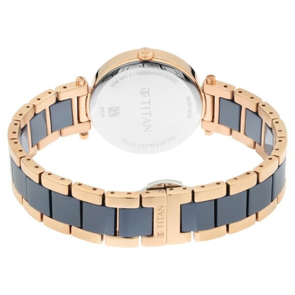 Titan 95061WD05 Blue Dial Two-Tone Ceramic & Metal Women’s Analog Watch
