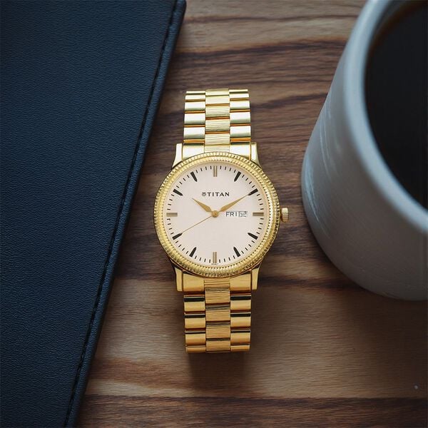 Titan – 1650YM03 Karishma Gold Stainless Steel Analog Men’s Watch with Day-Date