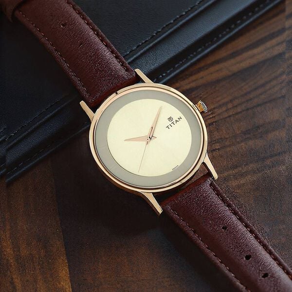 Titan 1672WL01 Men Champagne Dial Leather Strap Quartz Watch