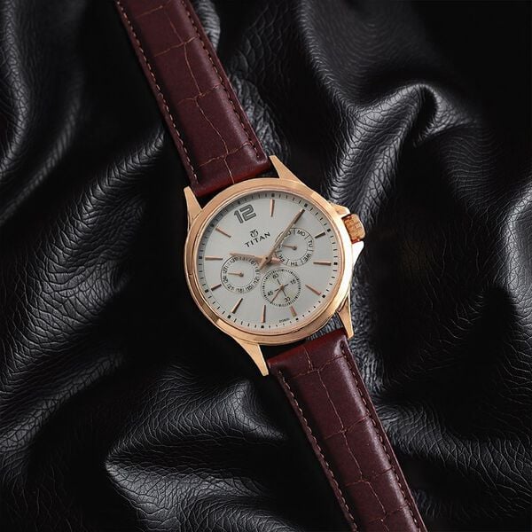 Titan 1698WL01 Men’s Quartz Multifunction Analog Watch with White Dial & Brown Leather Strap