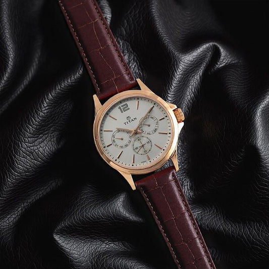 Titan 1698WL01 Men’s Quartz Multifunction Analog Watch with White Dial & Brown Leather Strap