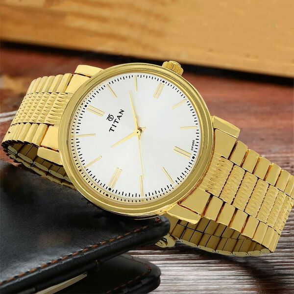 Titan NP1712YM01 Quartz Analog Silver Dial Golden Stainless Steel Strap Watch For Men