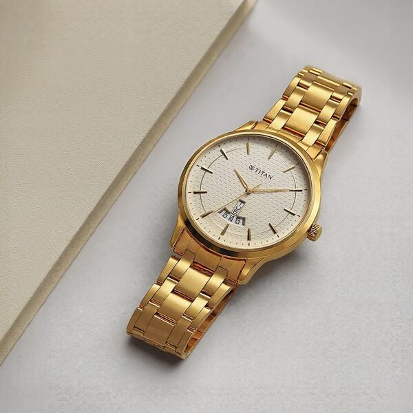 Titan 1825YM12 Champagne Dial Analog Quartz Stainless Steel Men’s Watch – Golden Band, Round Case, Date Display