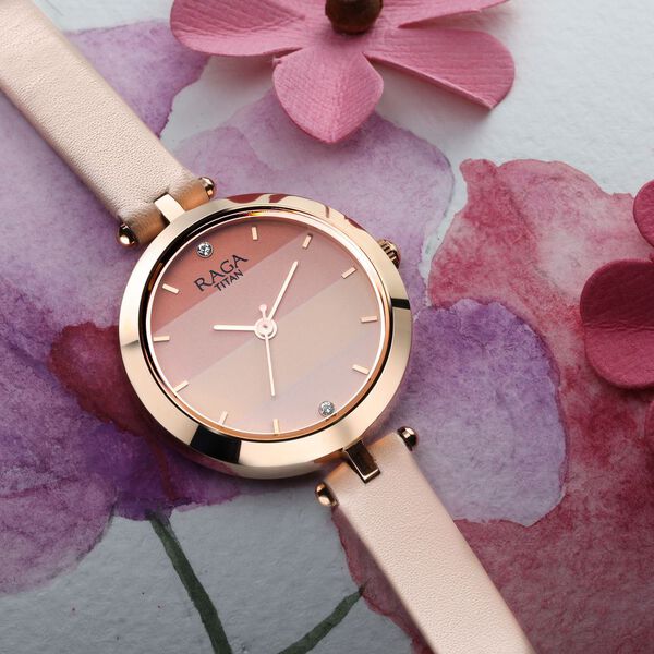 Titan 2606WL02 Women’s Pastel Pink Dial Analog Watch with Pink Leather Strap