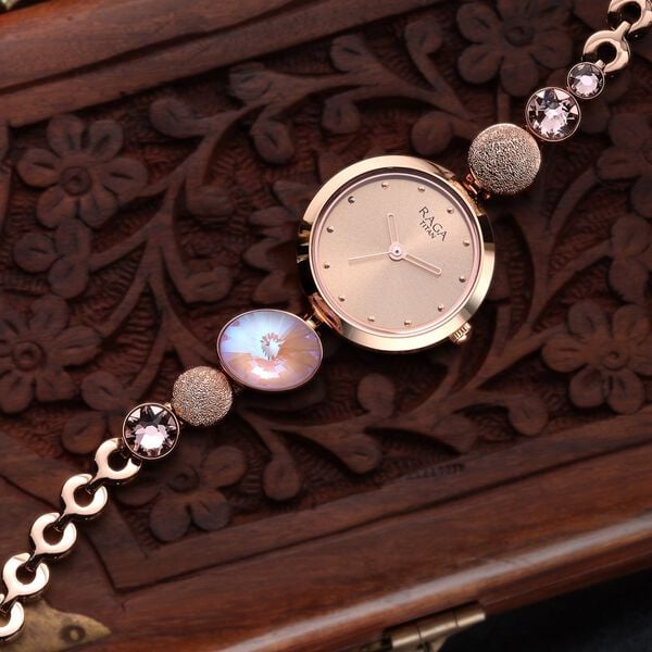 Titan 2606WM08 Women’s Mother-of-Pearl Dial Analog Watch with Rose-Gold Metal Strap